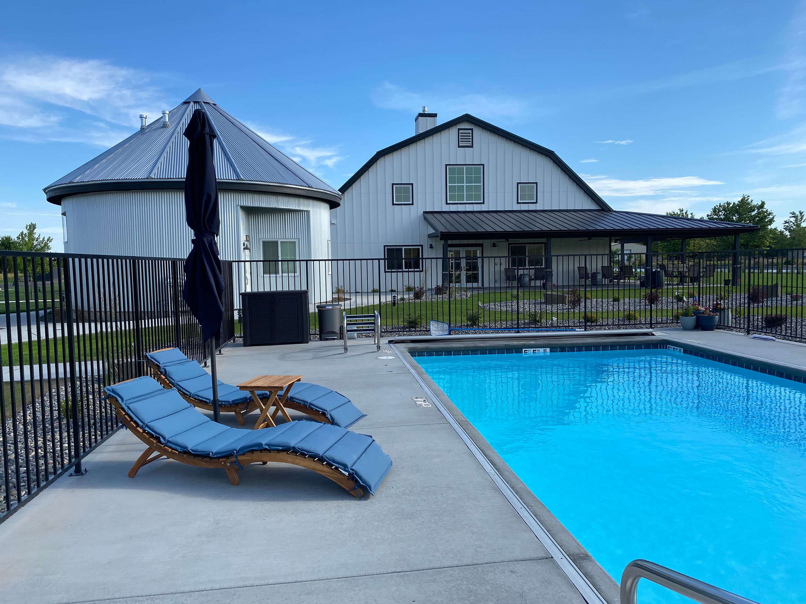 View of pool and a barn at the Barn B&B in Walla Walla, Washington
