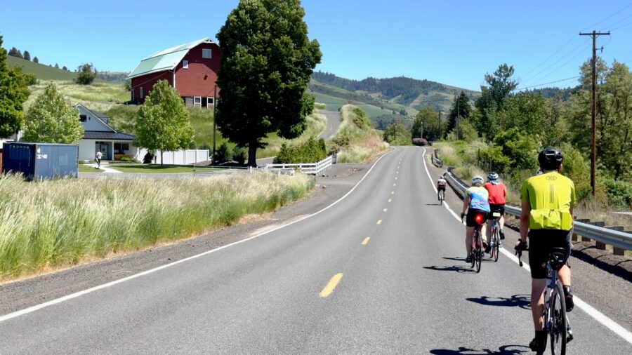 Bike Camp Walla Walla riding toward red barn