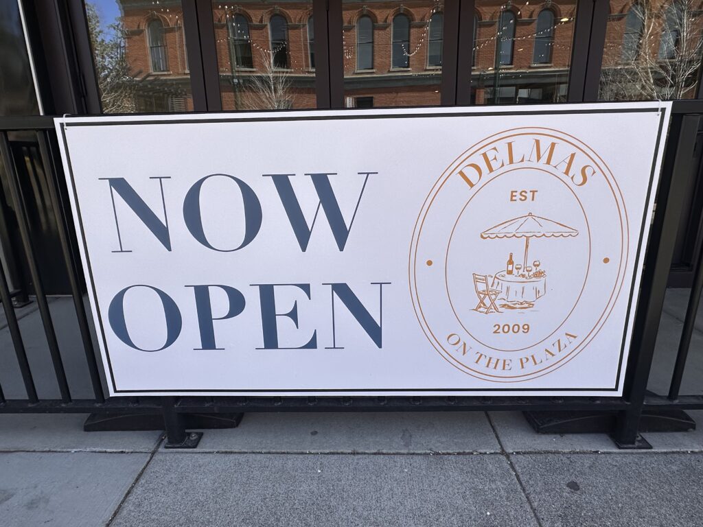 Delmas now open sign